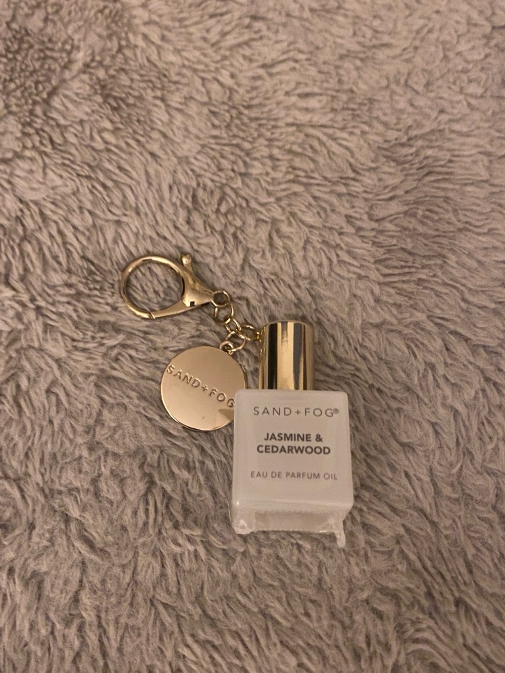 Jasmine and Cedar wood Sand + Fog perfume oil keychain